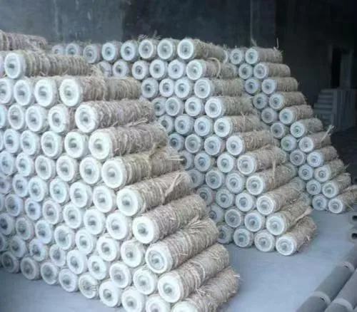 Wrapped cylindrical conveyor rollers stacked for storage